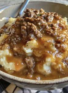 Ground Beef and Gravy Over Mashed Potatoes – The Ultimate Comfort Bowl